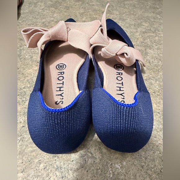 Rothy's Navy Flats with Cream Bow - Picture 2 of 3